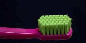 Closeup of a Pink Toothbrush