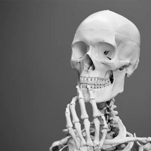 Skeleton assuming a thinking pose