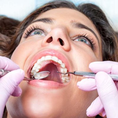 Dental check up Woman having a dental check up at the dentist